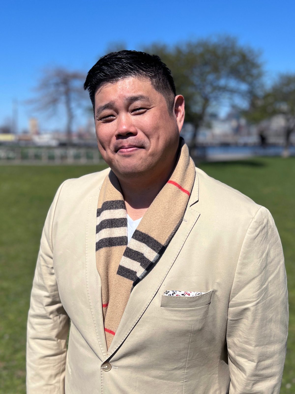 Dr. Sam D. Kim standing outdoors